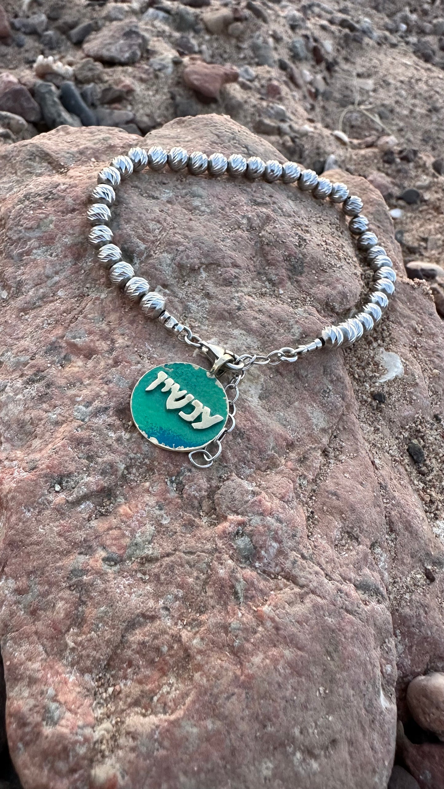 ״Achshav״ medallion with a 925 silver beads
Bracelet with A Hebrew word that means Now-coin jewelry -One of kind jewelry