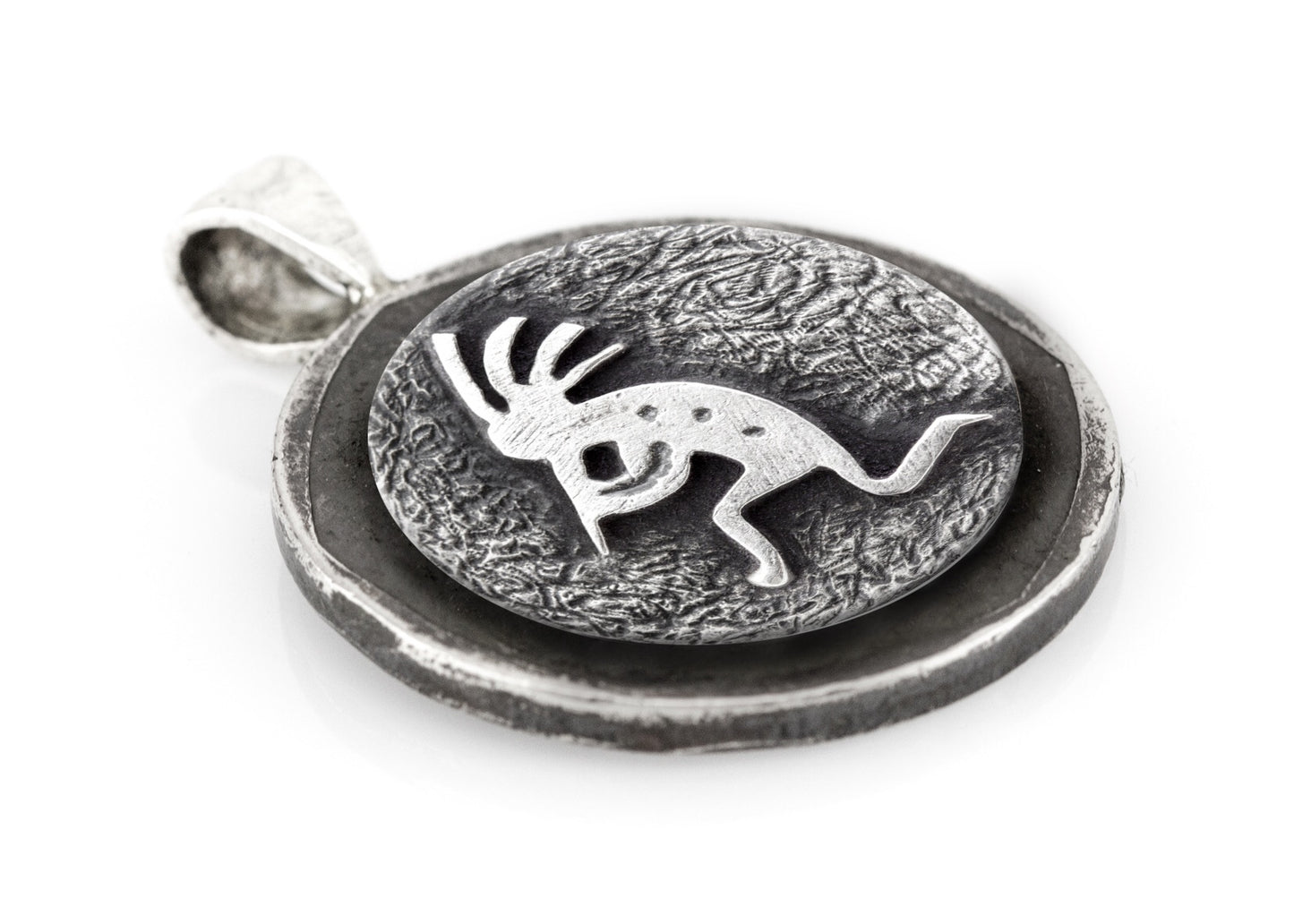 Kokopelli coin medallion and the Buffalo Nickel coin of USA